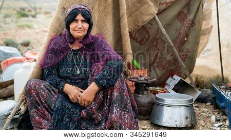 Shiraz, Iran - May 2019: Qashqai Nomadic Woman By Her Tent. The Qasqhai Are Nomadic People Living In