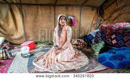 Shiraz, Iran - May 2019: Beautiful Qashqai Nomadic Woman Inside Her Tent. The Qasqhai Are Nomadic Pe