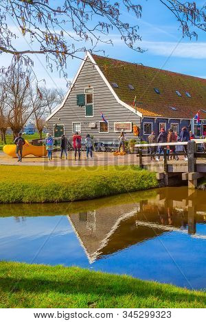 Zaanse Schans, Netherlands - April 1, 2016: Wooden Shoes, Clogs Or Klompens Museum In Holland, Peopl