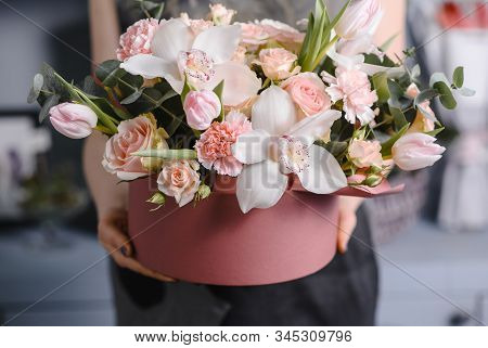 Very Nice Young Woman Holding Big And Beautiful Colourful Flower Wedding Bouquet With Purple Carnati
