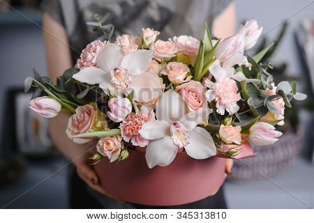 Very Nice Young Woman Holding Big And Beautiful Colourful Flower Wedding Bouquet With Purple Carnati