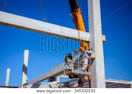 Zrenjanin, Vojvodina, Serbia - April 20, 2018:mobile Crane Is Operating And Worker Is Assembly Concr