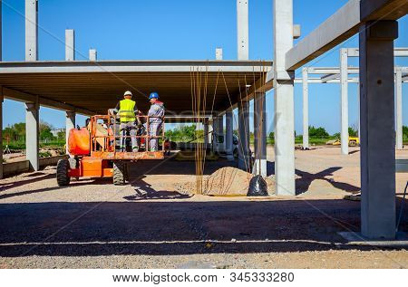 Zrenjanin, Vojvodina, Serbia - April 20, 2018: Rigger Is In High Elevated Cherry Picker, He Is Movin