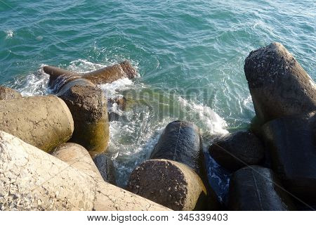 Breakwater Stones On Mole At Black Sea. Sea View And Vackground