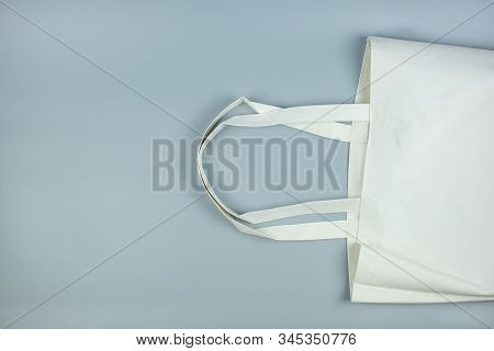 Eco Shopping Bag On Gray Background With Copy Space For Text. Environmental Protection, Zero Waste, 