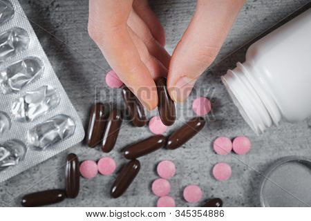 Concept Of Drugs Abuse. Taking A Pill Out Of Pile Of Medicines, Concept Of Sunstance Abuse Or Suicid