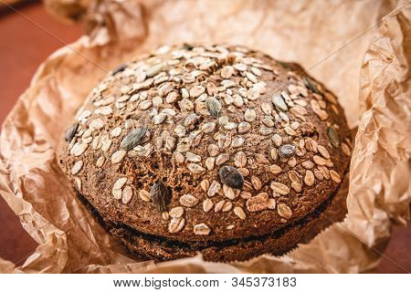 Whole Grain Traditional Rye Bread In Parchment Paper