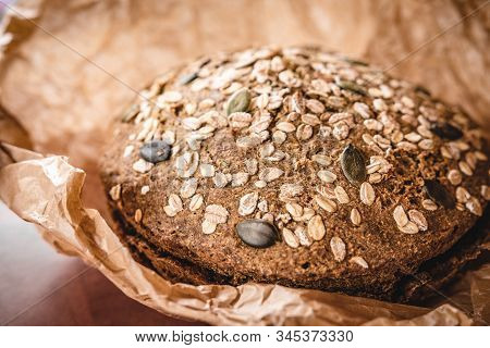 Whole Grain Traditional Rye Bread In Parchment Paper