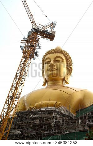 Bangkok , Thailand - January 13 , 2020 : The Large Outdoor Golden Sitting Buddha Is Phra Buddha Dham