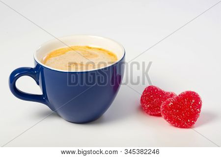 Cup Of Coffee With Fruit-paste Colorful Sweets On The Bright Background