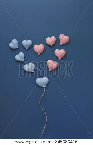Ten Small Meringues Of Pink And Blue Hearts Are Laid Out In Big Heart With With Rope Made Of Natural