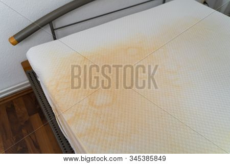 Dirty Old Bed Mattress With Yellow Stains