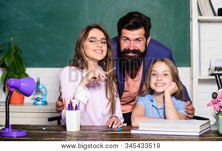 Extra Classes. Gifted Child. Little Girl Studying With Team Of Tutors. Private Lesson With Tutors. H