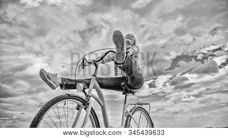 Woman Feels Free While Enjoy Cycling. Girl Rides Bicycle Sky Background. Cycling Gives You Feeling O