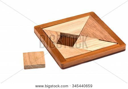 Tangram Wooden Puzzle Isolated On White Background. Chinese Tangram Puzzle. Puzzle Concept.
