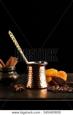 Turkish Coffee Maker And Ingredients On A Rustic Metal Table