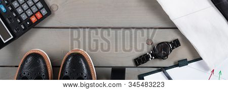 Banner With Businessman, Work Outfit On Grey Wooden Background.