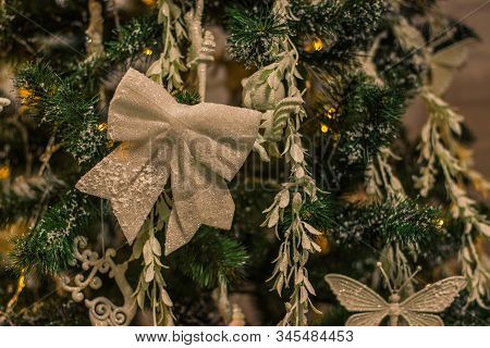 Interior Design Concept Of Hand Made Toys Decoration Of Christmas Tree In Pastel Colors And Soft Yel