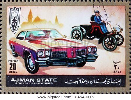 Frimärke Ajman 1972 Ford, bilar då och nu