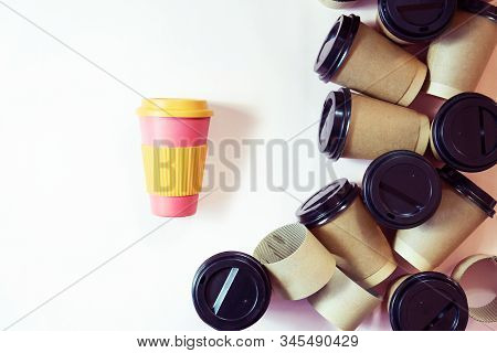 Zero Waste Concept Stylish Reusable Eco Coffee Cup And Multiple Single Use Cardboard Cups. Ban Singl