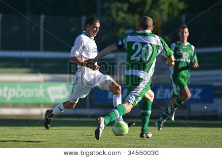 KAPOSVAR ฮังการี - 16 มิถุนายน: Gergo Lakatos (เขียว 20) ในการดำเนินการที่ Championsh ประเทศฮังการี