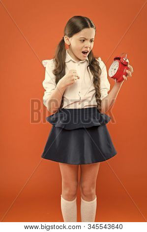 Girl Worry About Time. Children Education. Knowledge Day. Happy Girl Hold Alarm Clock Counting For L