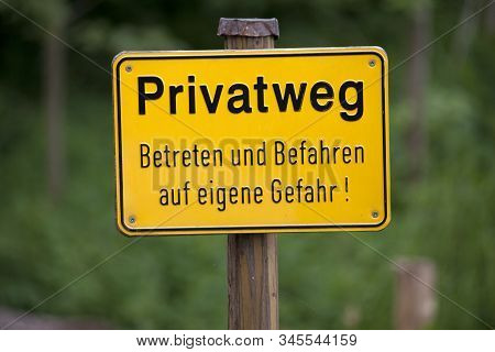 Private Ground Sign Warning In German Language Text Translation 