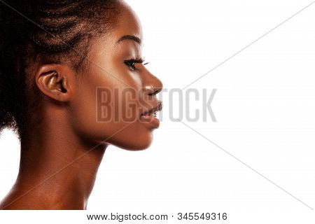 Profile View Of Young Beautiful African Model. Pretty African American Female Face With Healthy Skin