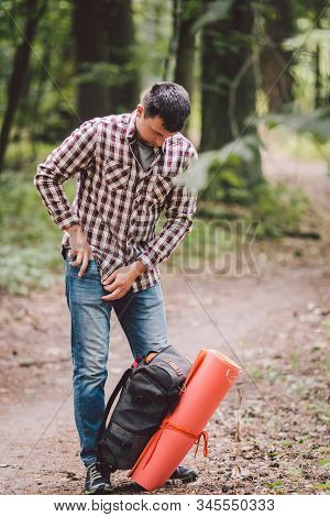 Guy With Backpack, Traveller, Hipster Standing In Woods, Hiking, Forest, Journey. Caucasian Tourist 