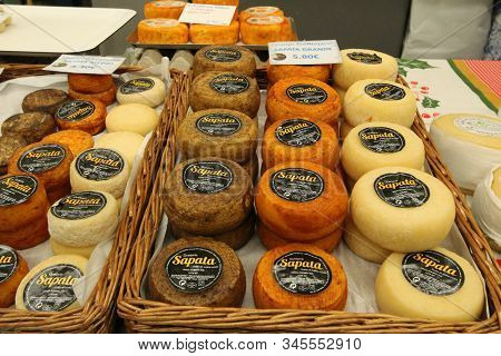 Oporto, Portugal- December 31, 2019: Diverse Kind Of Typical Portuguese Cheeses For Sale At A Market