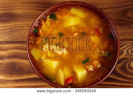 Kharcho Soup With Meat And Rice On Wooden Table. Top View