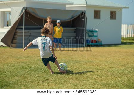 10 Th June, 2018, Sousse, Tunisia. Boys Playing Football On A Green Hotel Field During Their Summer 