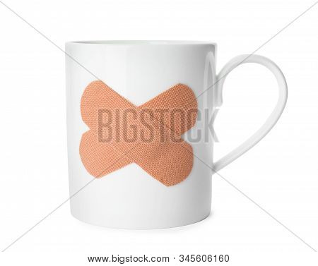 Cup With Sticking Plasters Isolated On White