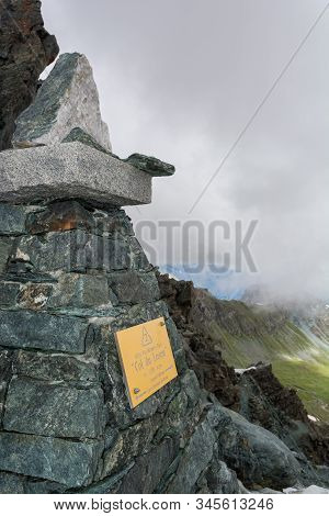 Pyramide Indicating The Pass Col Loson In Italian Alps.