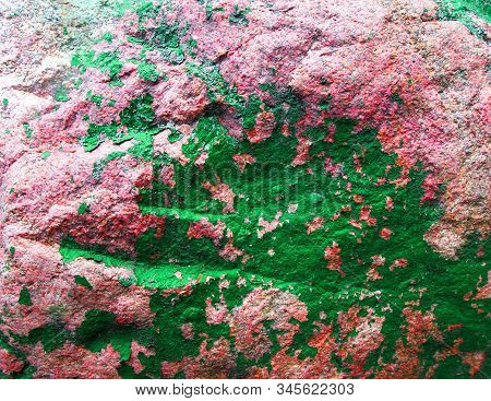 Old Painted Granite Stone Rock Background. Brown, Green, Pink. Red