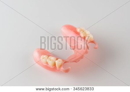 Large Image Of A Modern Denture On A White Background