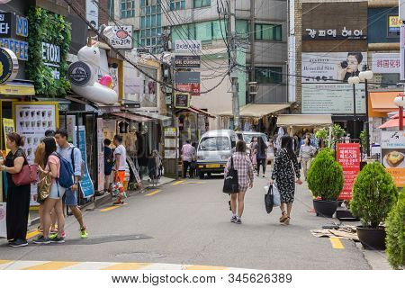 Seoul, South Korea - June 15, 2018: Crowed Tourist And Visitor At Ewha Shopping Street, The Famous S