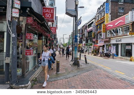 Seoul, South Korea - June 15, 2018: Crowed Tourist And Visitor At Ewha Shopping Street, The Famous S