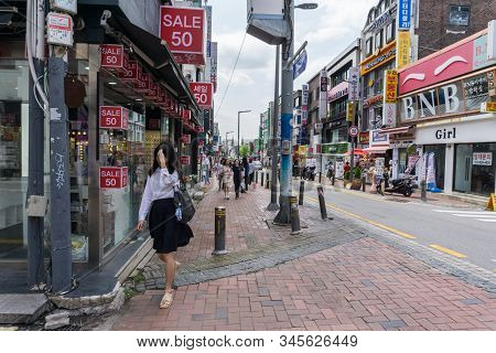 Seoul, South Korea - June 15, 2018: Crowed Tourist And Visitor At Ewha Shopping Street, The Famous S