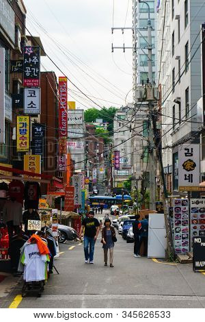 Seoul, South Korea - June 15, 2018: Crowed Tourist And Visitor At Ewha Shopping Street, The Famous S