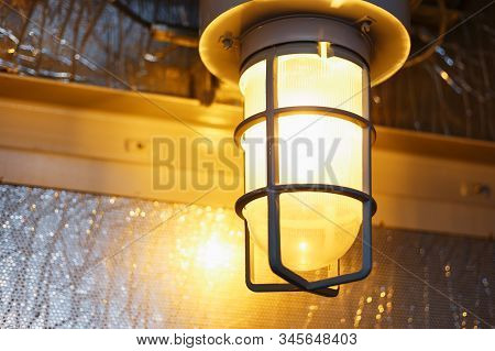 Explosion-proof Lamp For Fighting Industrial Enterprises With Warm Lighting. In The Premises Of Indu
