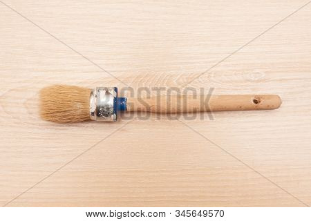 Round Brush To Cover The Tree Close-up. Stock Photo Of A Construction Brush.