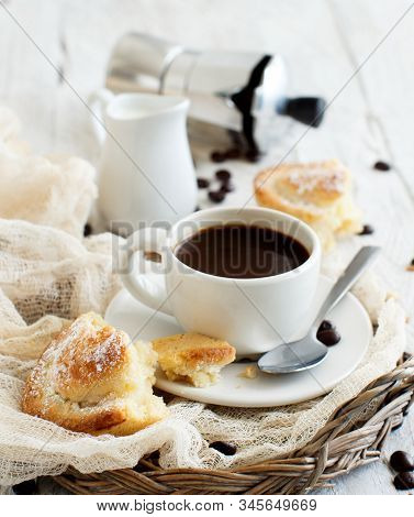 Cup Of Coffee With Pasticciotto Pastry On A Rustic Background Close Up