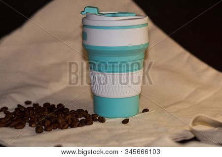 Blue Reusable Cup Transformer For Coffee And Drinks Take Away Made Of Food Silicone. Repeated Proces