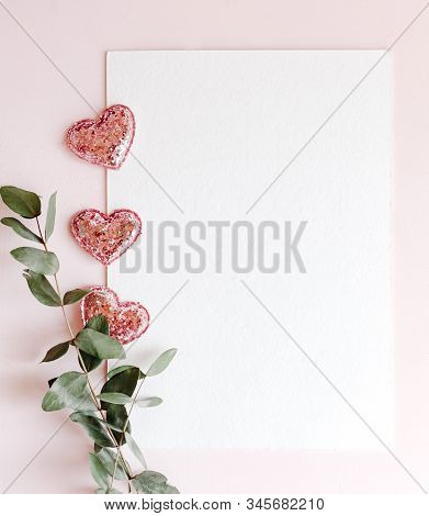 Background With Copy Space Blank On Pink Background With Pink Glittered Hearts, Eucalyptus Branch. W