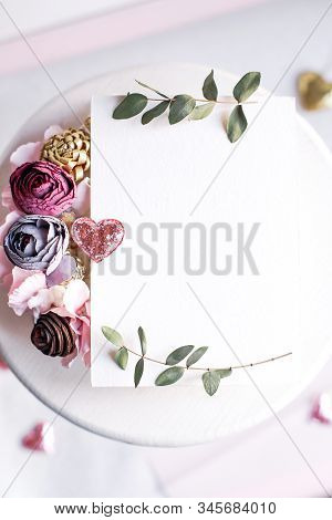 Background With Copy Space Blank On White Table With Glitter Heart, Eucalyptus Branch, Flowers And L