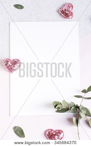 Background With Copy Space Blank On White Table With Glitter Heart, Eucalyptus Branch, Flowers And L