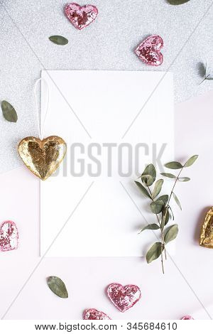 Background With Copy Space Blank On White Table With Glitter Heart, Eucalyptus Branch, Flowers And L