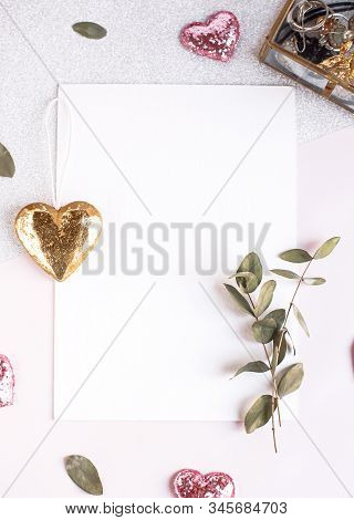 Background With Copy Space Blank On White Table With Glitter Heart, Eucalyptus Branch, Flowers And L