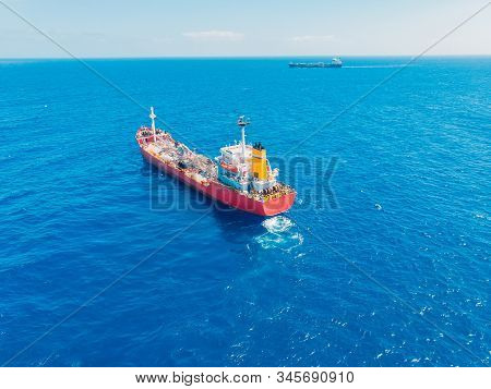Oil Chemical Tanker Sails Blue Sea. Aerial Top View